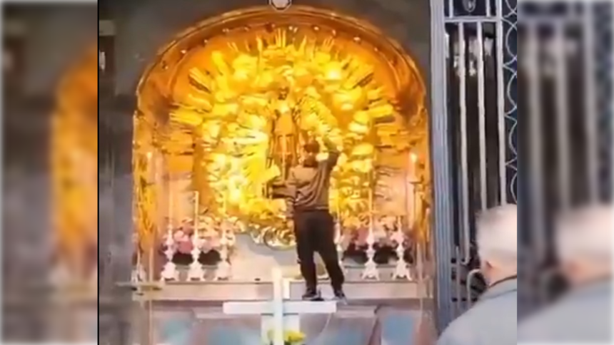 Afghan Asylum Seeker Climbs Alter – Rips Off the Gowns of the Famous Black Madonna of Switzerland and Puts On Her Crown – VIDEO | The Gateway Pundit